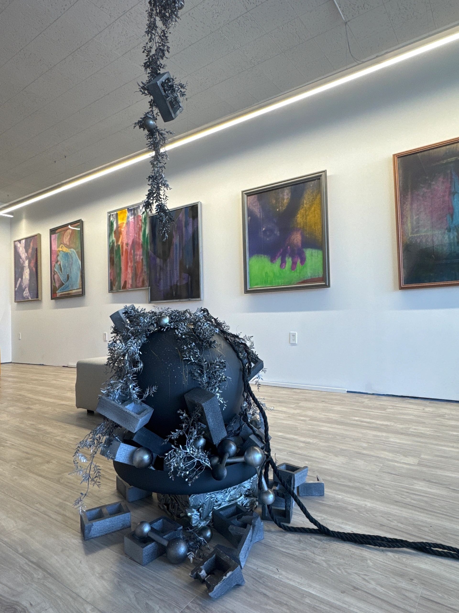 Contemporary art gallery with sculpture